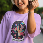 girl listening to music wearing a oversized tshirt with vibrant graphic and text be included