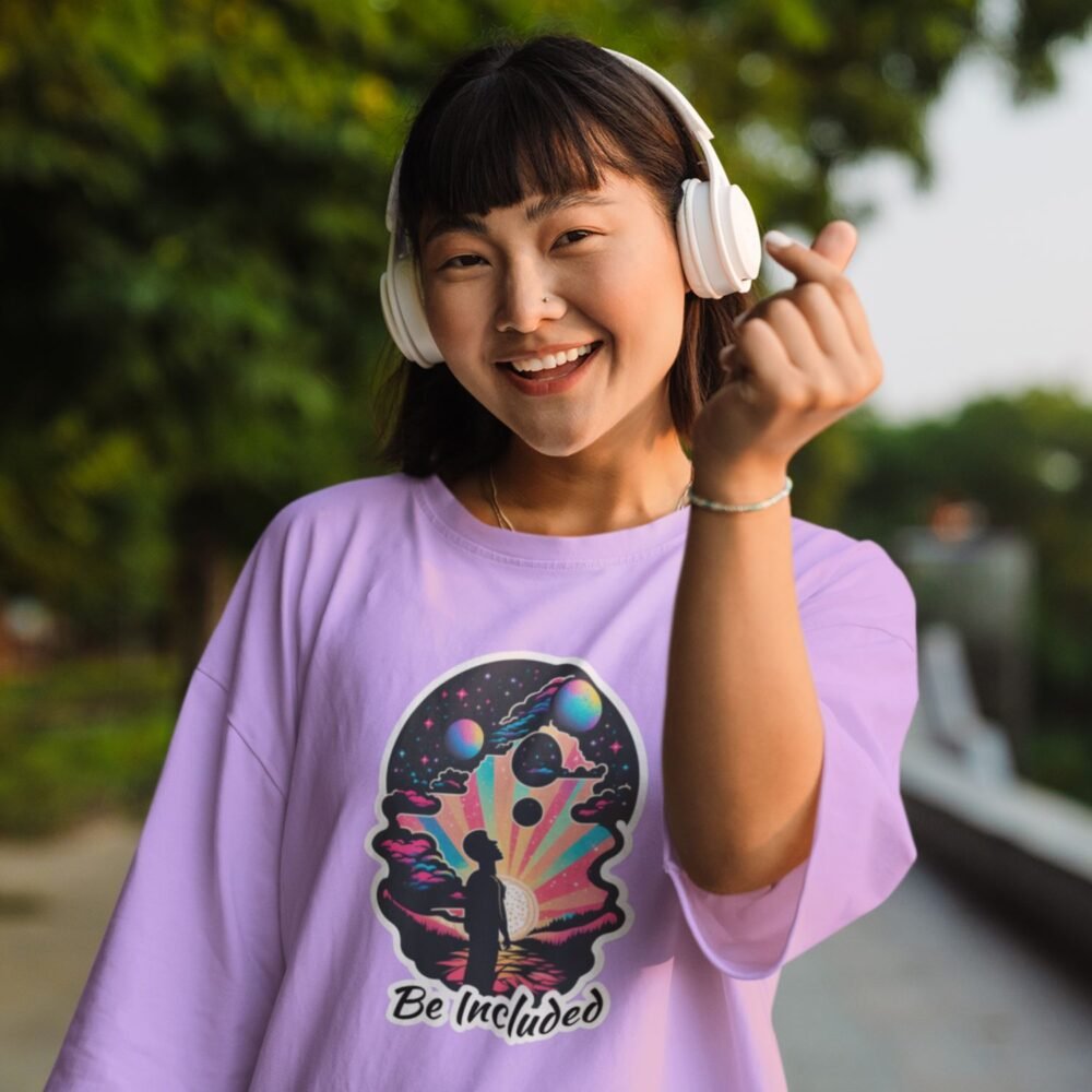 girl wearing oversized tshirt with text be included iris lavender color and cool vibrant graphics on it