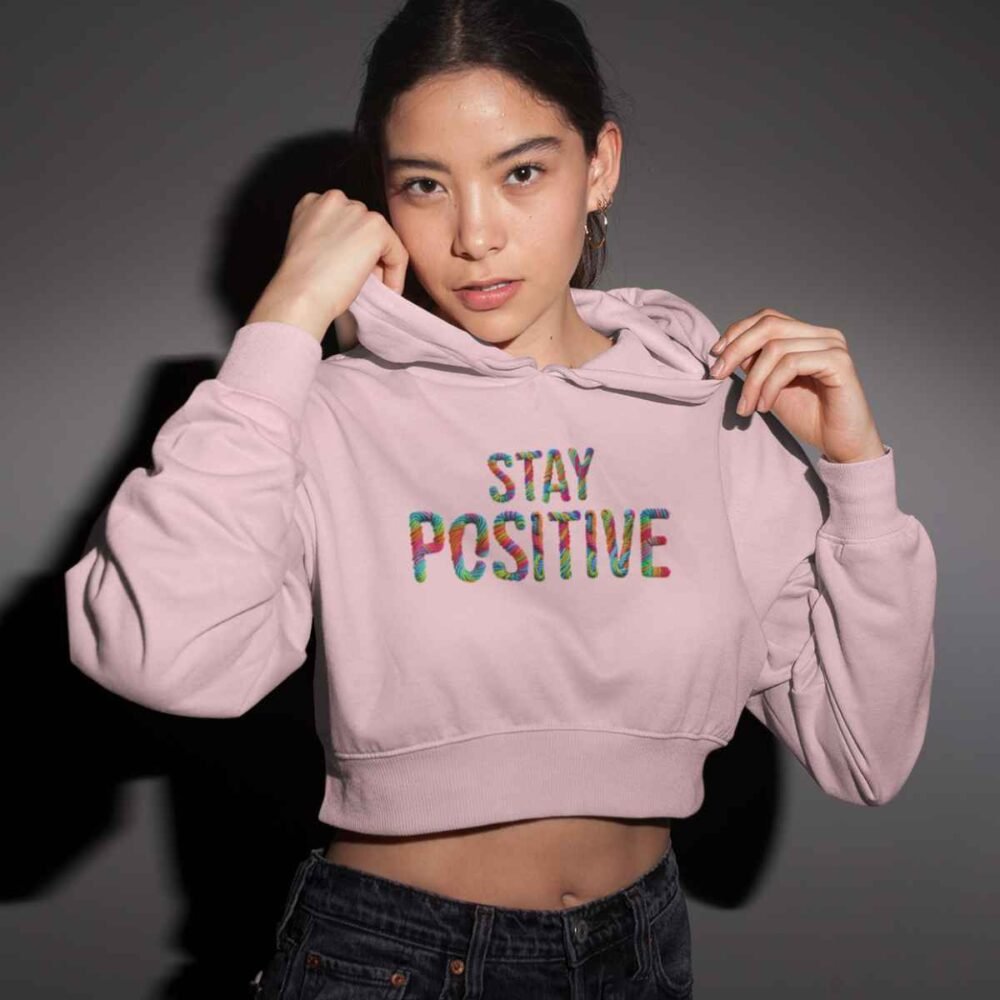 women wearing cropped hoodie printed "stay positivie"